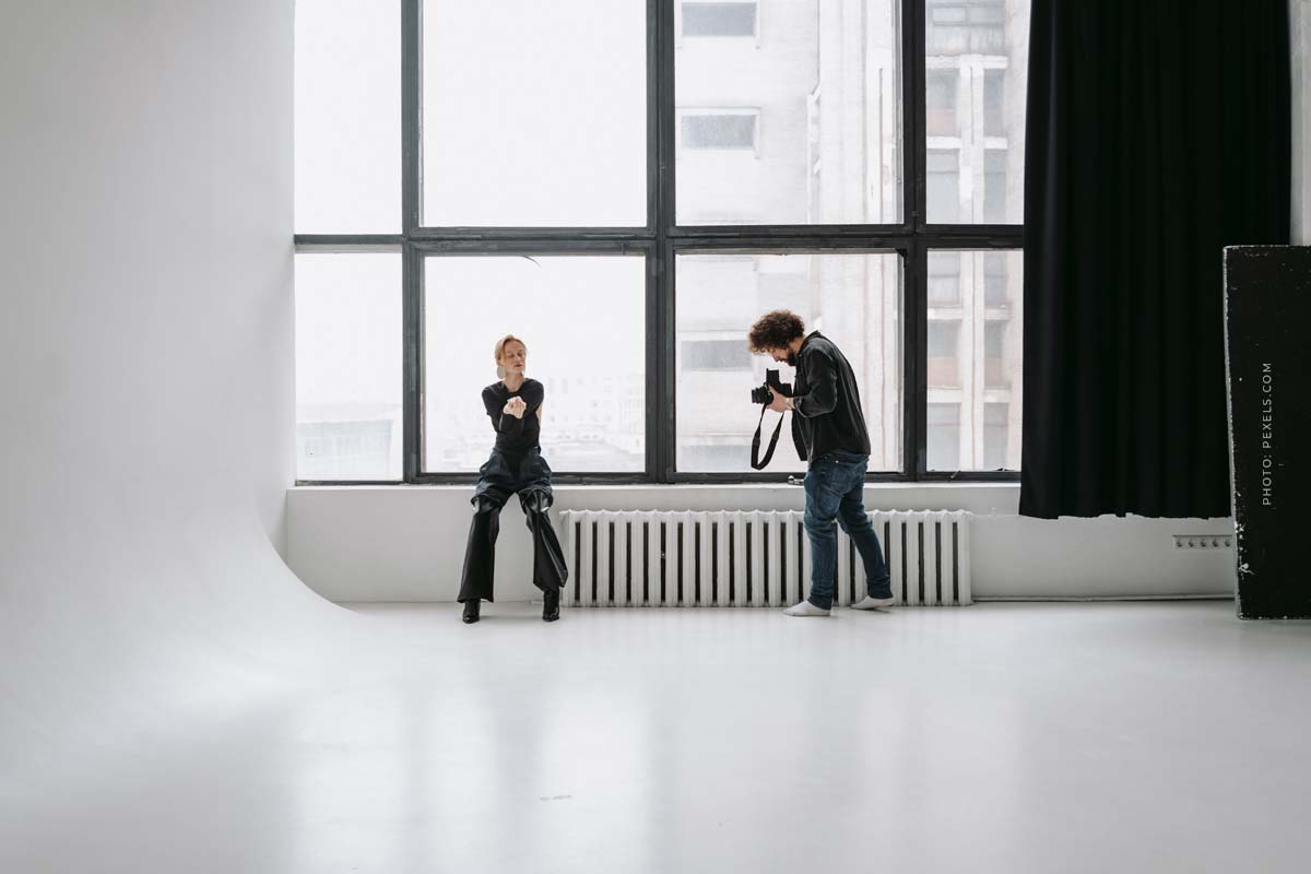 model-agency-management-young-model-photographer-studio-camera-window