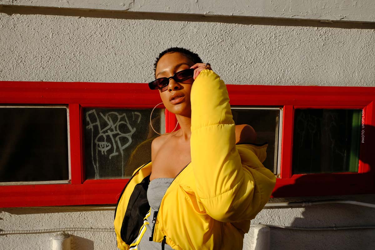 model-agency-management-young-model-yellow-puffer-jacket-grafitti-tag-earrings